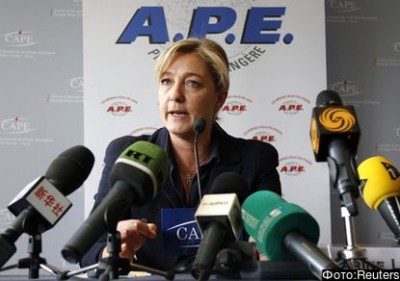 Marine Le Pen, France's National Front head and far right candidate for 2012 French presidential election, attends a press conference at the CAPE in Paris